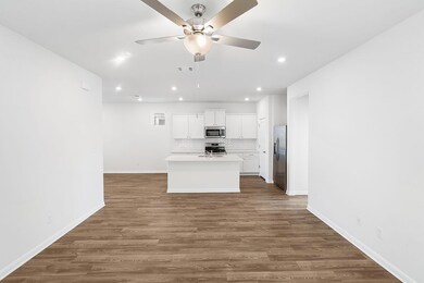 Kitchen featuring appliances with stainless steel
