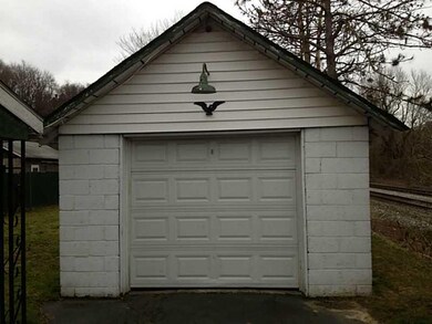 Parking Lot/Garage. 1 car detached garage