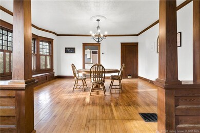 Large Dining room has a beautiful window seat.