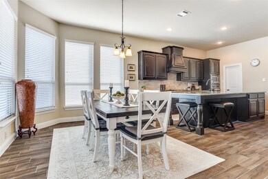 Breakfast room looking into kitchen