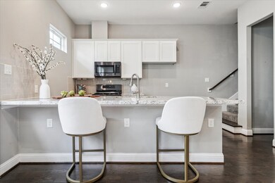 Additional seating at kitchen peninsula.