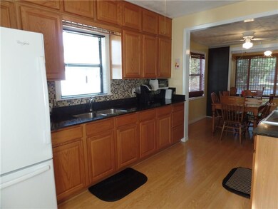 Kitchen with floor to ceiling cabinetry & Italian Quartz Counter-tops