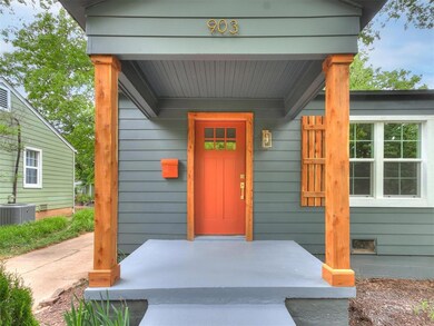 Doorway to property with central air condition uni