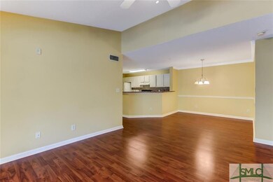 Open floor plan offers vaulted ceilings, laminate 