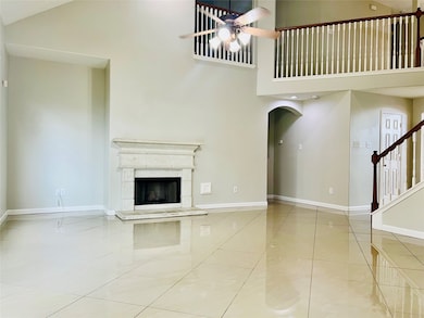 Spacious family room offers a gas log fireplace &
