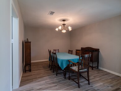 Formal dining room to the right of the front door.
