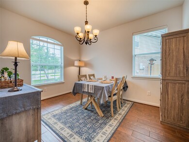 this is the very spacious formal dining room , gre