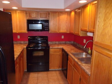 KITCHEN W BLACK APPLIANCES