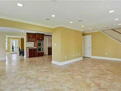 Living Room. Beautiful porcelain-tile flooring thr