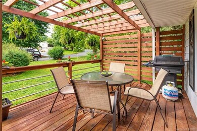Cozy front porch with pergola