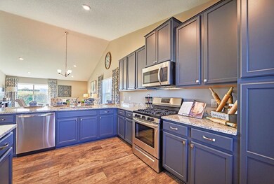 Stainless gas range, vented microwave and dishwash