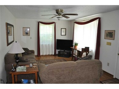 Living Room. Great room to relax in. Hardwood fls 