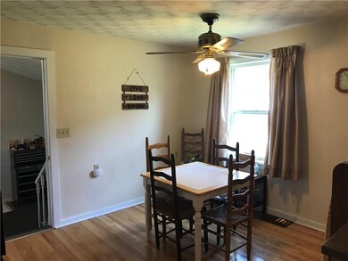 Real hardwood floors in kitchen/dining area.
