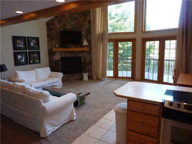 Living Room. Enjoy breathtaking sunsets from your 