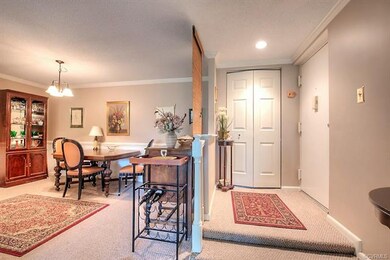 Foyer with coat closet open floor plan