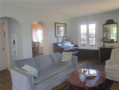 Another view of living room heading in to dining r