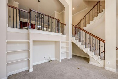 Stairs featuring carpet and crown molding