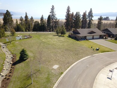 6 - Borders flowing creek & common area