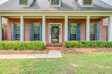 Enjoy relaxing on the home's large front porch, pe