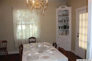 Dining room with twin built in cabinets.