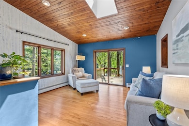 Family room with sliding glass door to back deck