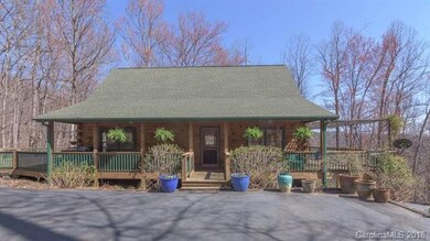 Covered side porch offers main level entry.
