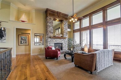Stunning Great Room with one of three gas fireplac