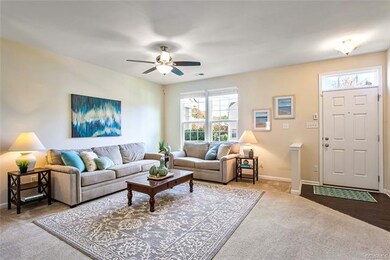 Family Room w Ceiling Fan. 9 ft Ceilings