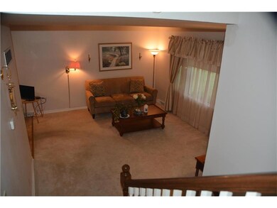 Living room on main level with Hardwood floors und
