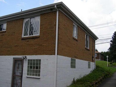 Exterior Front. Glass Block Windows