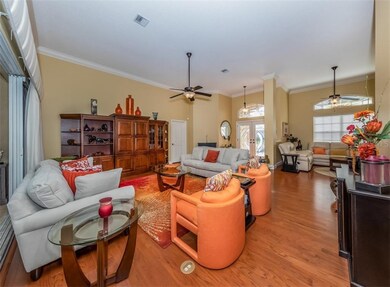 Great room to foyer and dining room/den