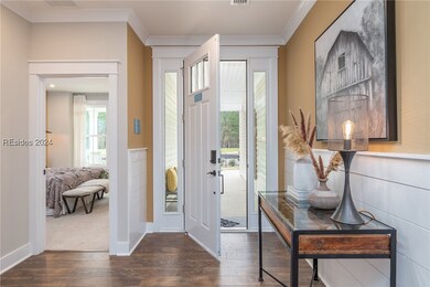 Entryway featuring dark hardwood / wood-style floo
