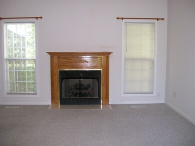 Relax In This Beautiful Living Room Featuring Gas Log Fireplace And Vaulted Ceiling !