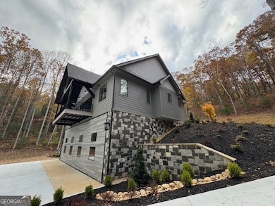 Right side elevation of home and airplane hangar.