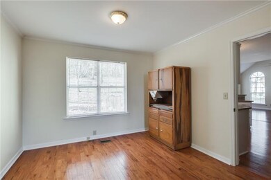 Gorgeous natural lights flood the formal dining room!