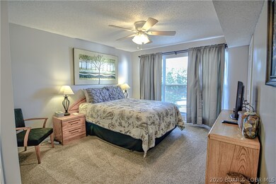 The spacious master bedroom has a private bath and