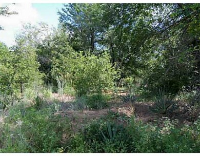 Land. Heavily wooded, makes a great place to build