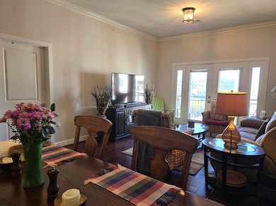 Open concept! High ceilings and pretty crown moldi