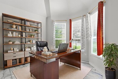 Office featuring light marble finish flooring and