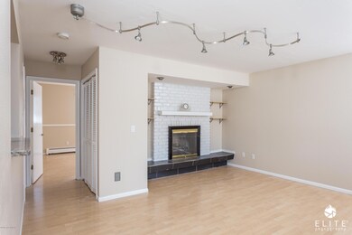 Living Area w/ Fireplace