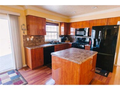 Kitchen. Updated appliances & island w/custom pull
