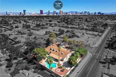 Drone / aerial view of a skyline view and a pool