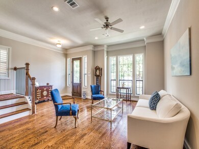 Gleaming wood floors, crown molding, natural light
