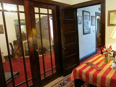 Entry/Foyer. Original Glass Doors between Entry an