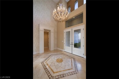 Inviting Dual Glass Door Entry into to Open Embell