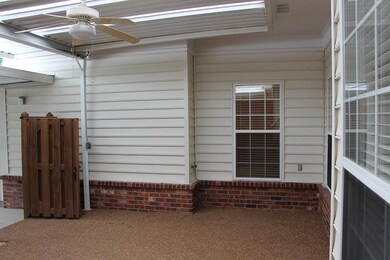 Patio between condo and carport