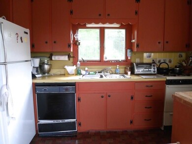 Kitchen has a gas stove, dishwasher,...