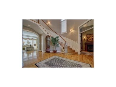 Open foyer with a curved staircase!