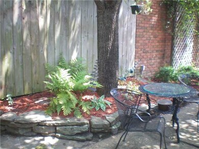 Mature ferns & hostas are part of the landscaping 