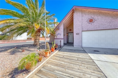 View of front of property with a garage, driveway,